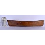 AN EARLY 20TH CENTURY NORTH AMERICAN CARVED WOOD CANOE possibly Inuit. 47 cm wide.