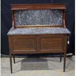 A marble topped wooden side board with a marble and wooden back stand.