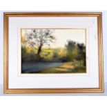 A large framed pastel by Norman Smith "Dusk at Woolstone"