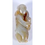 A CHINESE GREE JADE FIGURE OF A PEACH CARRIER. 6.5cm x 2.9cm, weight 33g