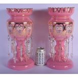 A PAIR OF PINK ENAMELLED OPALINE GLASS LUSTRES. 38 cm x 15 cm.