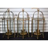 Three large glass and brass lanterns with electric fittings 70 x 33 cm (3)