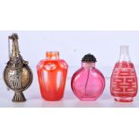 FOUR CHINESE SNUFF BOTTLES. Largest 8.5cm x 3.8cm, weight 175g (4)