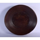AN ANTIQUE TREEN COUNTRY DAIRY BOWL. 37 cm diameter.