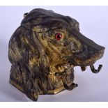 AN ANTIQUE COLD PAINTED BRONZE SPANIEL INKWELL with glass eyes. 10 cm x 10 cm.