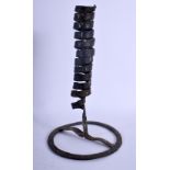 AN EARLY CONTINENTAL CAST IRON CANDLESTICK. 20 cm high.