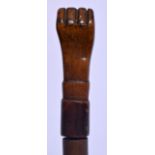 A LATE 18TH/19TH CENTURY EUROPEAN FRUITWOOD FIST HANDLED SWORD STICK. 85 cm long.
