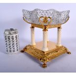 AN EDWARDIAN TURNED IVORY AND YELLOW METAL CRYSTAL GLASS PEDESTAL BOWL with column supports. 21 cm x