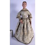 A LARGE 19TH CENTURY SPANISH HALF TORSO DOLL with silk work dress. 53 cm x 20 cm.