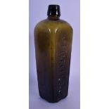 AN 18TH CENTURY WEST INDIAN GREEN GLASS GIN BOTTLE. 25 cm high.