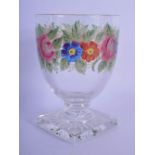 AN ANTIQUE ENAMELLED GLASS RUMMER painted with flowers. 15 cm high.