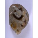 A SMALL 19TH CENTURY CHINESE CARVED JADE TOGGLE Qing, overlaid with a beast. 4 cm x 2.5 cm.