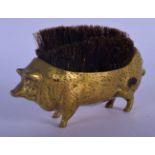 AN EARLY VICTORIAN BRASS PEN PIG WIPE. 10 cm wide.