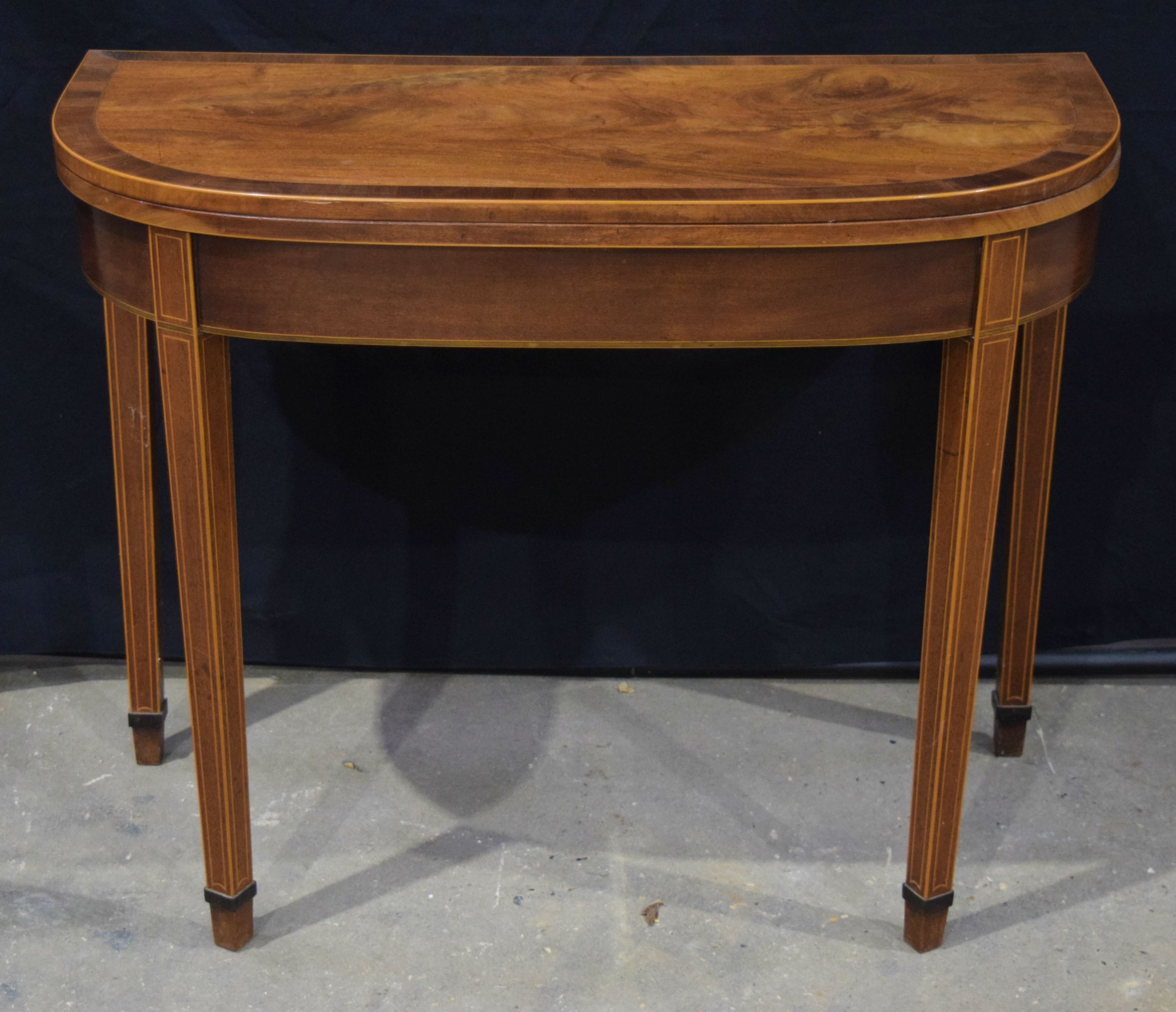 A Victorian walnut D end fold over table with inlay to top 75 x 96 x 46 cm .