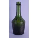 AN EARLY BENEDICTINE GREEN GLASS BOTTLE. 24 cm high.