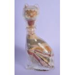 AN UNUSUAL VINTAGE SAND FILLED GLASS FIGURE OF A CAT. 14 cm high.
