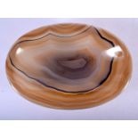 A FINE EARLY 20TH CENTURY EUROPEAN CARVED BANDED AGATE BOWL of wonderful natural form. 15 cm x 10 cm