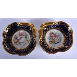 EARLY 19TH C. COALPORT FINE PAIR OF SHELL SHAPED DISHES PAINTED WITH FLOWERS. 22cm diameter. 5cm h