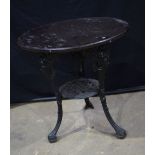 A heavy antique cast iron wooden topped garden stand. 69 x 67 cm.