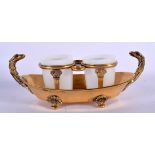 AN ANTIQUE FRENCH EMPIRE GILT METAL PALAIS ROYALE TABLE SALT. 21 cm wide.