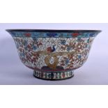 A RARE 17TH CENTURY CHINESE CLOISONNE ENAMEL BOWL Late Ming, decorated with the horses of Mu Wang. 2