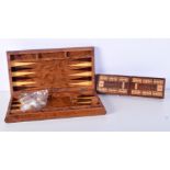 A Burr walnut rectangular folding back gammon board together with a cribbage box 33 cm square (2)