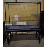 A huge glass and wood shop display cabinet 186 x 152 x 62 cm.