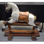A VICTORIAN PAINTED WOOD ROCKING HORSE. 85 cm x 92 cm.