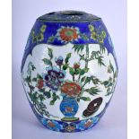 A 1950S CHINESE CLOISONNE ENAMEL JAR AND COVER decorated with foliage. 11 cm x 8 cm.