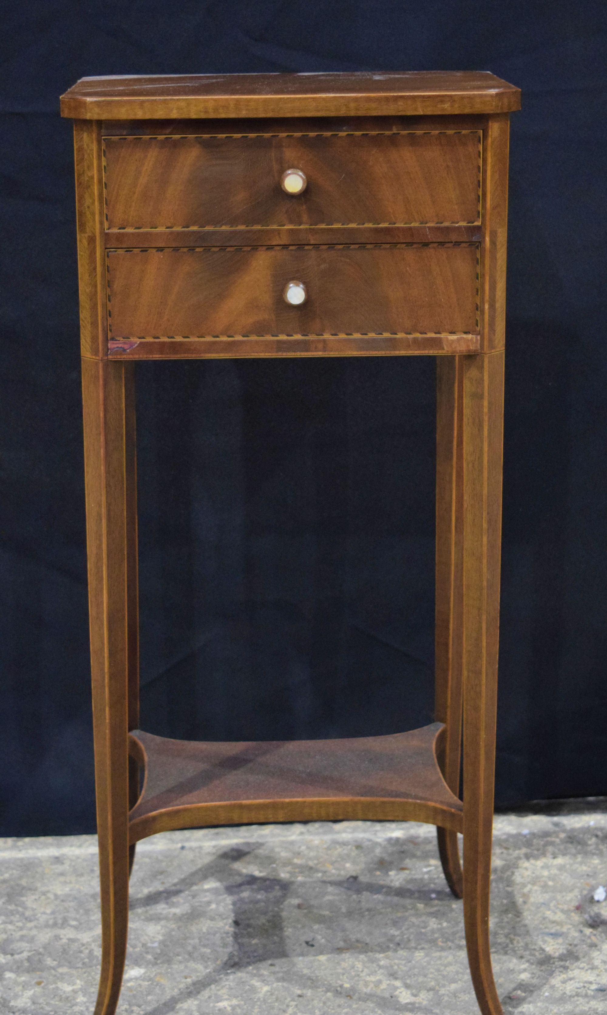 An Edwardian walnut two drawer two tier hall stand with inlay to border of drawers 67 x 28 x 21