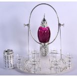 A SILVER PLATED CRANBERRY GLASS BIRD DECANTER with glasses. 40 cm x 30 cm.