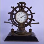 A RARE 19TH CENTURY EUROPEAN INDUSTRIAL SHIPS WHEEL CLOCK with revolving base and inset barometer &