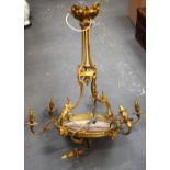 A LARGE ANTIQUE BRASS CHANDELIER. 87 cm x 64 cm.