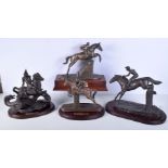 A collection of large Spelter and bronzed metal Horse racing trophies 31 x 24 cm (4)