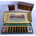 A CHARMING MINORU HORSE RACING GAME together with a money box etc. (3)