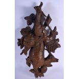 A LARGE 19TH CENTURY BAVARIAN BLACK FOREST CARVED HUNTING PLAQUE depicting a deer and game birds. 54