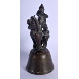 AN 18TH/19TH CENTURY INDIAN HINDU BRONZE BELL. 12 cm high.