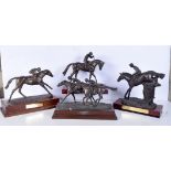 A collection of Large Spelter Horse racing trophies 20m x 44 cm (4)
