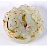 A CHINESE CARVED GREEN JADE ROUNDEL. 5.3cm diameter, weight 58g