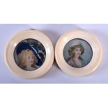 A PAIR OF 19TH CENTURY EUROPEAN PAINTED IVORY PORTRAIT MINIATURES depicting females. 6 cm diameter.