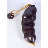 A JAPANESE HARDWOOD INRO CARVED AS A FRUITING POD. 18cm x 6cm x 3.5cm, weight 139g