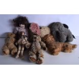 A collection of vintage teddy's , animals, dolls etc (7)