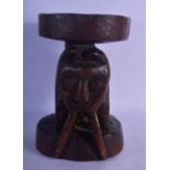 A LARGE VINTAGE AFRICAN TRIBAL CARVED WOOD STOOL formed as a long tusked animal. 32 cm x 22 cm.