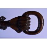 A VINTAGE AFRICAN TRIBAL CARVED WOOD MONKEY SHOOTING STICK. 90 cm long.