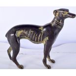 A small bronze model of a dog 14 x 16 cm .