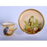 ROYAL WORCESTER CUP AND SAUCER PAINTED WITH BIRDS DATE MARK FOR 1874. Cup 6cm high, Saucer 13.5cm di