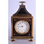 AN ANTIQUE SILVER GILT AND TORTOISESHELL TRAVELLING CLOCK decorated with roundels. 346 grams. 12.5 c