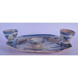 AN 18TH CENTURY EUROPEAN FAIENCE TIN GLAZED INKWELL painted with landscapes. 21 cm x 18 cm.