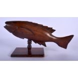 A PIT CAIRN ISLANDS CARVEDD WOOD FLYING FISH. 29 cm x 15 cm.