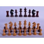 AN EARLY 20TH CENTURY BOXWOOD AND CARVED WOOD CHESS SET. Largest piece 8 cm high. (qty)